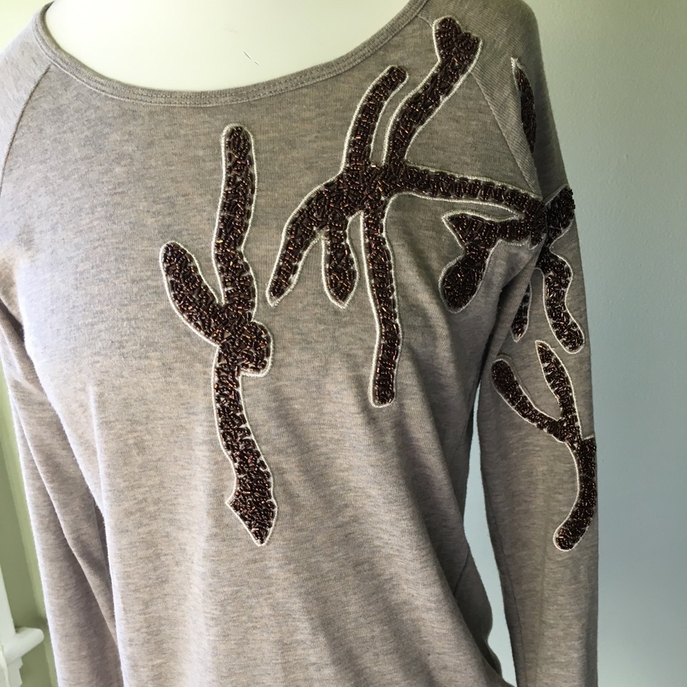 Embellished pullover by THEME.